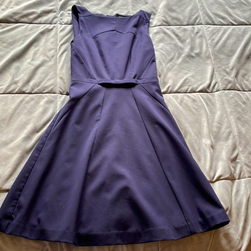 Navy dress, size 4. Perfect for work or business casual events.